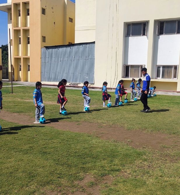 Coach-led SportsGuru physical education session with Indian school students