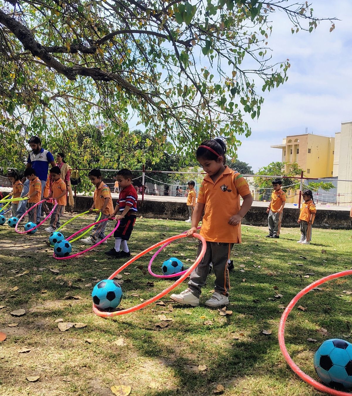 Indian school children participating in a SportsGuru team activity